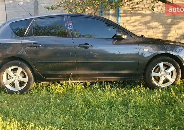 Сірий Мазда 3, об'ємом двигуна 1.6 л та пробігом 210 тис. км за 5300 $, фото 9 на Automoto.ua