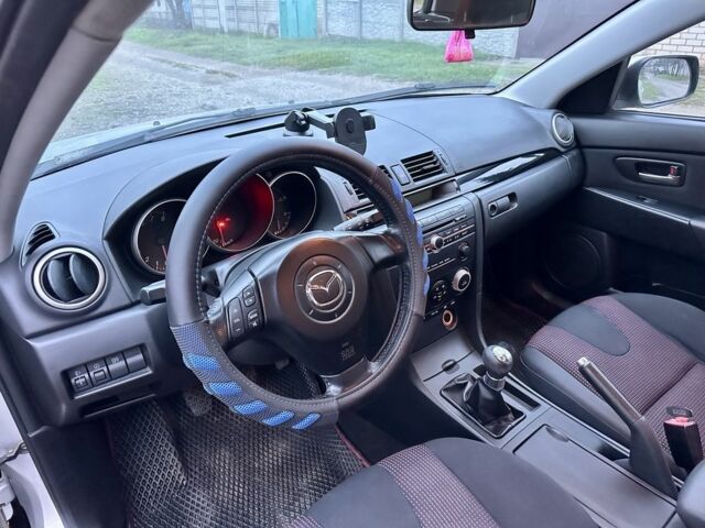 Сірий Мазда 3, об'ємом двигуна 1.6 л та пробігом 187 тис. км за 3950 $, фото 9 на Automoto.ua
