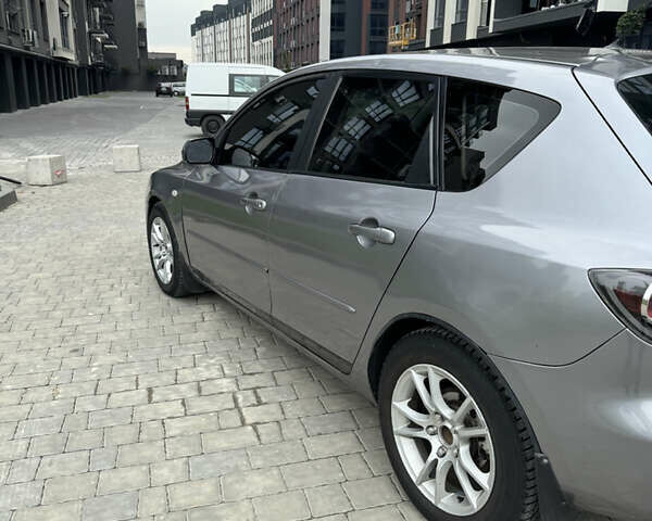 Сірий Мазда 3, об'ємом двигуна 1.56 л та пробігом 319 тис. км за 3700 $, фото 13 на Automoto.ua