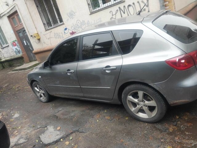 Серый Мазда 3, объемом двигателя 1.6 л и пробегом 2 тыс. км за 2098 $, фото 5 на Automoto.ua