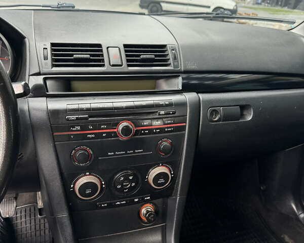 Сірий Мазда 3, об'ємом двигуна 1.56 л та пробігом 319 тис. км за 3700 $, фото 23 на Automoto.ua