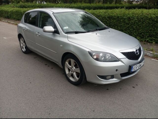 Серый Мазда 3, объемом двигателя 1.6 л и пробегом 239 тыс. км за 1872 $, фото 1 на Automoto.ua