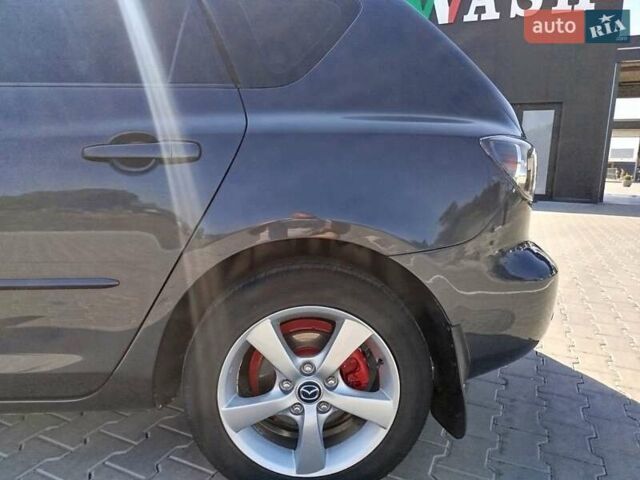 Сірий Мазда 3, об'ємом двигуна 1.6 л та пробігом 297 тис. км за 5550 $, фото 15 на Automoto.ua