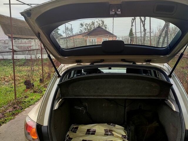 Сірий Мазда 3, об'ємом двигуна 1.3 л та пробігом 220 тис. км за 4500 $, фото 4 на Automoto.ua