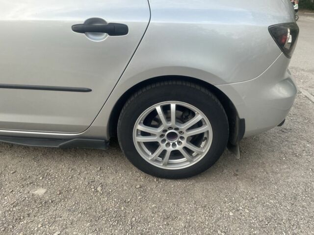 Сірий Мазда 3, об'ємом двигуна 1.3 л та пробігом 217 тис. км за 4999 $, фото 4 на Automoto.ua