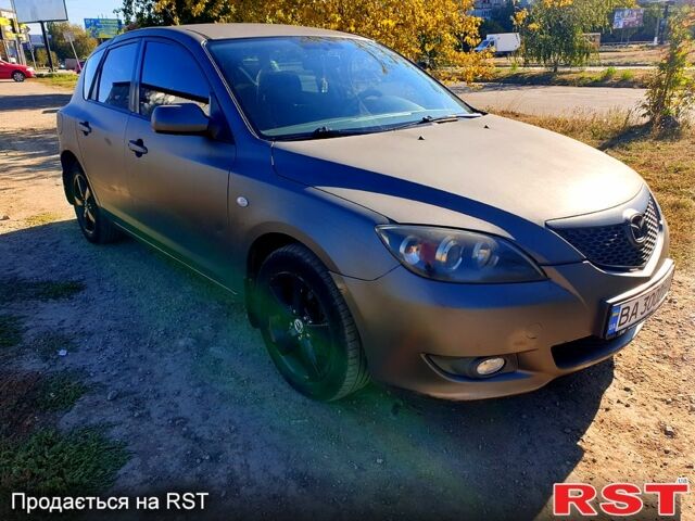 Серый Мазда 3, объемом двигателя 1.6 л и пробегом 296 тыс. км за 4000 $, фото 3 на Automoto.ua