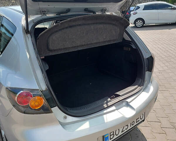 Серый Мазда 3, объемом двигателя 1.6 л и пробегом 211 тыс. км за 4750 $, фото 12 на Automoto.ua