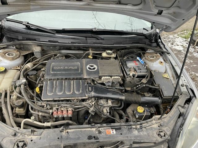 Серый Мазда 3, объемом двигателя 1.6 л и пробегом 227 тыс. км за 2900 $, фото 5 на Automoto.ua