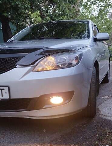 Серый Мазда 3, объемом двигателя 1.6 л и пробегом 297 тыс. км за 5600 $, фото 7 на Automoto.ua