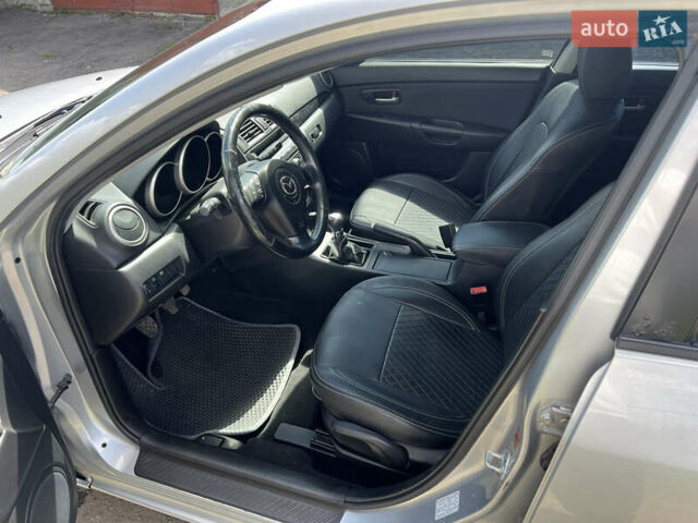 Сірий Мазда 3, об'ємом двигуна 1.6 л та пробігом 232 тис. км за 4200 $, фото 7 на Automoto.ua