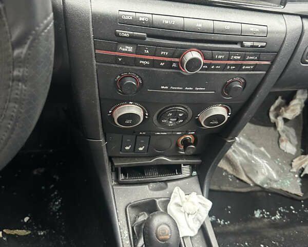 Серый Мазда 3, объемом двигателя 1.6 л и пробегом 200 тыс. км за 1750 $, фото 3 на Automoto.ua