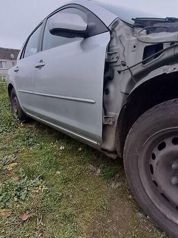 Серый Мазда 3, объемом двигателя 1.6 л и пробегом 370 тыс. км за 2200 $, фото 5 на Automoto.ua