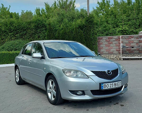 Серый Мазда 3, объемом двигателя 1.6 л и пробегом 211 тыс. км за 4750 $, фото 1 на Automoto.ua