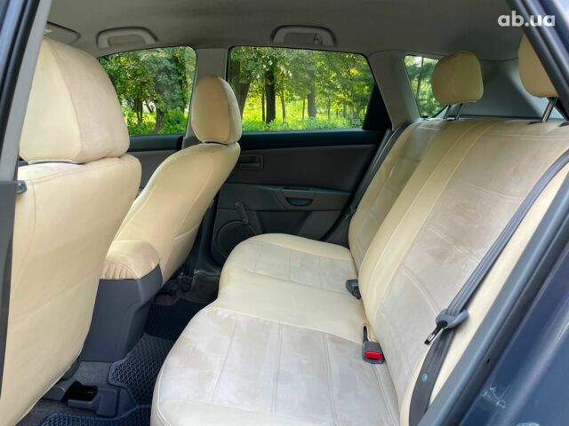 Сірий Мазда 3, об'ємом двигуна 1.4 л та пробігом 305 тис. км за 5340 $, фото 19 на Automoto.ua