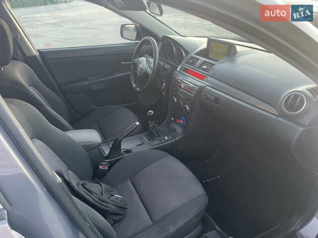Серый Мазда 3, объемом двигателя 2 л и пробегом 300 тыс. км за 6500 $, фото 9 на Automoto.ua