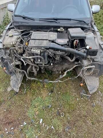 Серый Мазда 3, объемом двигателя 1.6 л и пробегом 370 тыс. км за 2200 $, фото 3 на Automoto.ua