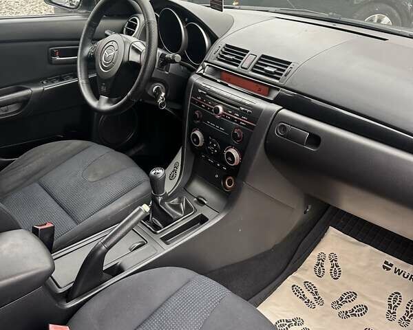 Сірий Мазда 3, об'ємом двигуна 1.6 л та пробігом 216 тис. км за 4800 $, фото 11 на Automoto.ua