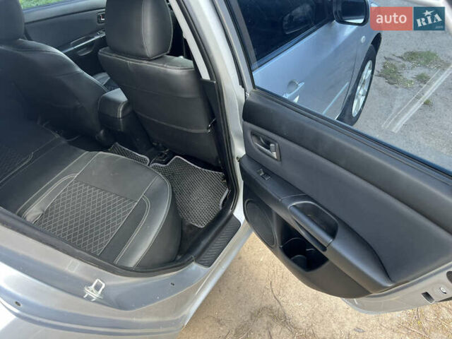 Сірий Мазда 3, об'ємом двигуна 1.6 л та пробігом 232 тис. км за 4200 $, фото 17 на Automoto.ua