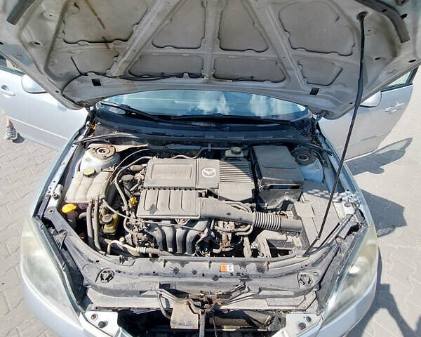 Серый Мазда 3, объемом двигателя 1.6 л и пробегом 211 тыс. км за 4750 $, фото 16 на Automoto.ua