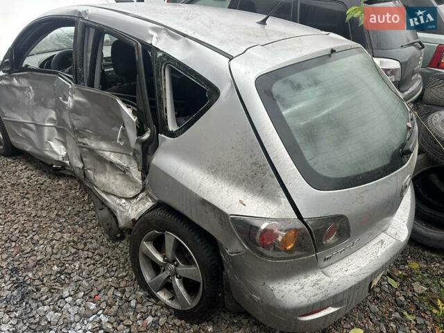 Серый Мазда 3, объемом двигателя 1.6 л и пробегом 200 тыс. км за 1750 $, фото 7 на Automoto.ua