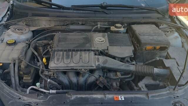 Серый Мазда 3, объемом двигателя 1.6 л и пробегом 230 тыс. км за 4150 $, фото 30 на Automoto.ua