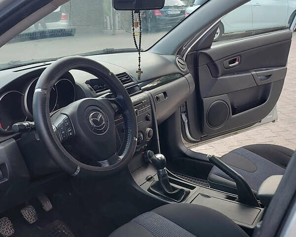 Серый Мазда 3, объемом двигателя 1.6 л и пробегом 211 тыс. км за 4750 $, фото 6 на Automoto.ua