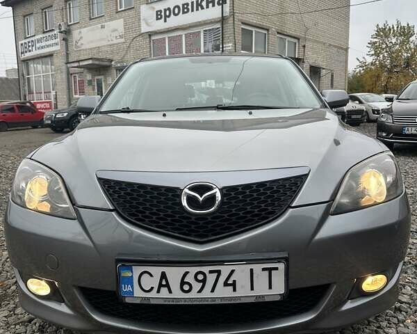 Сірий Мазда 3, об'ємом двигуна 1.6 л та пробігом 216 тис. км за 4800 $, фото 5 на Automoto.ua
