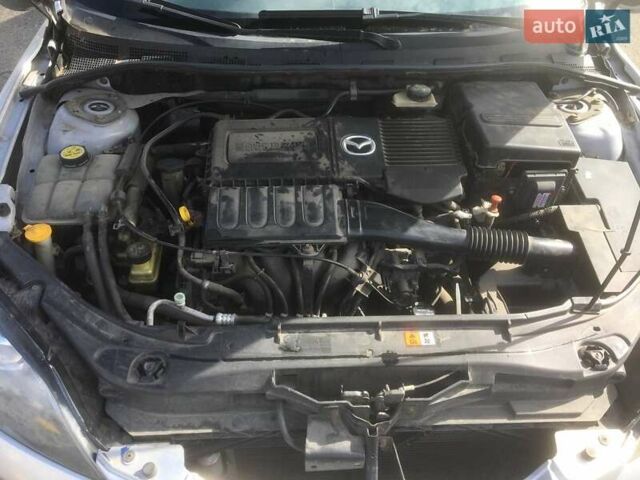 Сірий Мазда 3, об'ємом двигуна 1.6 л та пробігом 251 тис. км за 5300 $, фото 9 на Automoto.ua