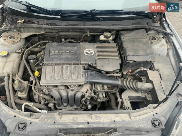 Серый Мазда 3, объемом двигателя 1.6 л и пробегом 196 тыс. км за 4500 $, фото 18 на Automoto.ua