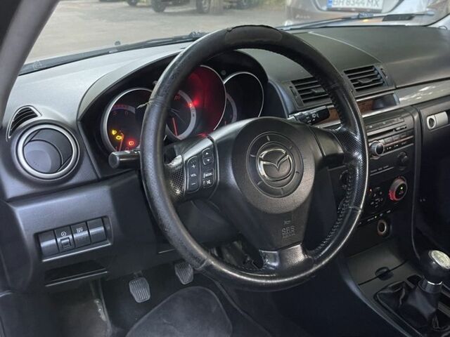 Серый Мазда 3, объемом двигателя 1.6 л и пробегом 250 тыс. км за 1950 $, фото 6 на Automoto.ua