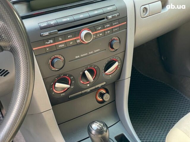 Сірий Мазда 3, об'ємом двигуна 1.4 л та пробігом 305 тис. км за 5340 $, фото 16 на Automoto.ua