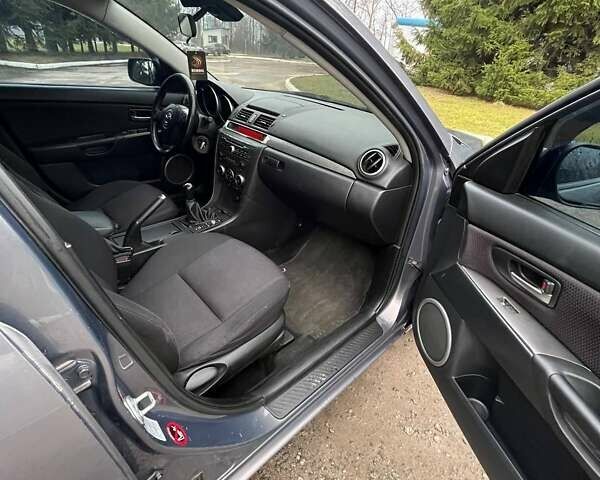 Серый Мазда 3, объемом двигателя 2 л и пробегом 302 тыс. км за 4200 $, фото 20 на Automoto.ua