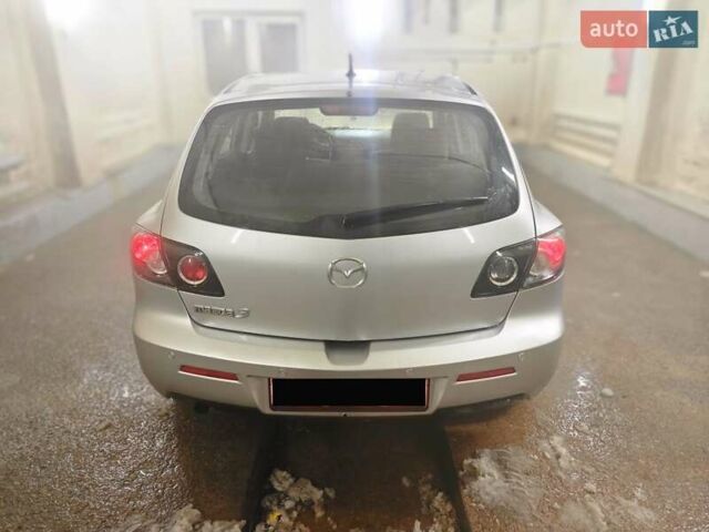 Серый Мазда 3, объемом двигателя 1.6 л и пробегом 118 тыс. км за 5599 $, фото 5 на Automoto.ua