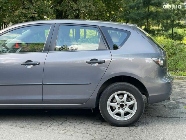 Сірий Мазда 3, об'ємом двигуна 1.4 л та пробігом 305 тис. км за 5340 $, фото 8 на Automoto.ua