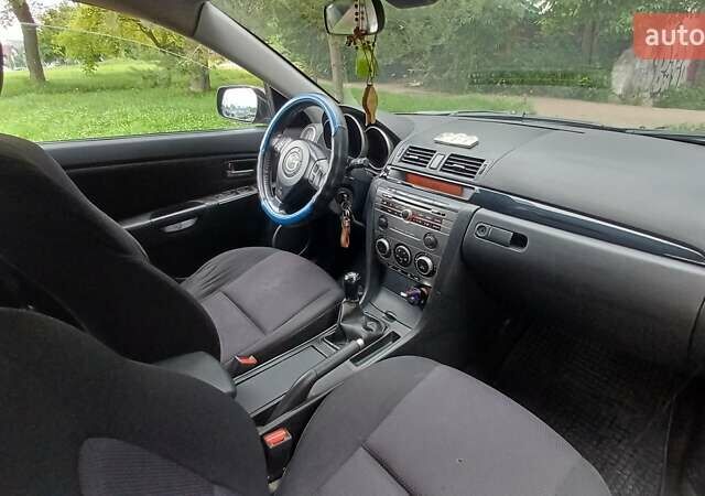 Серый Мазда 3, объемом двигателя 1.56 л и пробегом 380 тыс. км за 3600 $, фото 3 на Automoto.ua