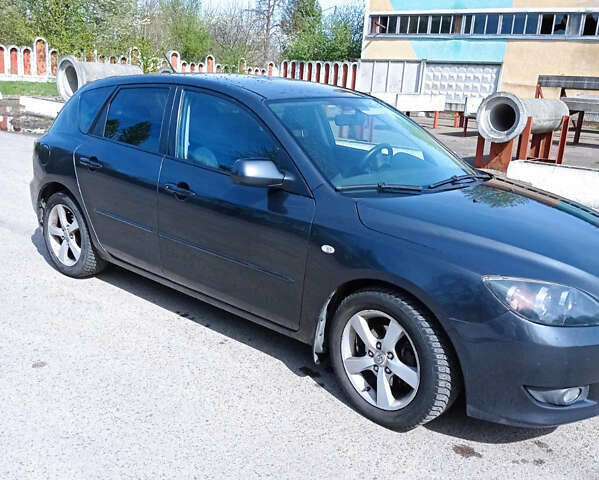 Сірий Мазда 3, об'ємом двигуна 1.6 л та пробігом 291 тис. км за 5300 $, фото 2 на Automoto.ua