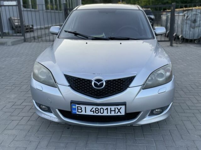 Сірий Мазда 3, об'ємом двигуна 1.6 л та пробігом 259 тис. км за 4497 $, фото 23 на Automoto.ua