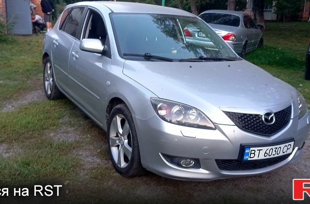 Серый Мазда 3, объемом двигателя 2 л и пробегом 230 тыс. км за 3100 $, фото 1 на Automoto.ua