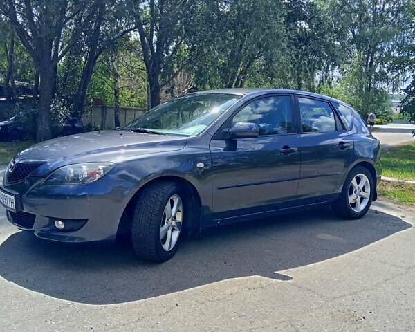 Сірий Мазда 3, об'ємом двигуна 1.56 л та пробігом 247 тис. км за 6700 $, фото 9 на Automoto.ua
