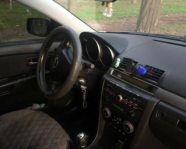 Серый Мазда 3, объемом двигателя 1.56 л и пробегом 179 тыс. км за 5450 $, фото 8 на Automoto.ua