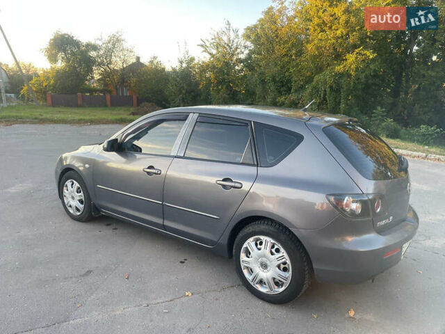 Серый Мазда 3, объемом двигателя 2 л и пробегом 300 тыс. км за 6500 $, фото 6 на Automoto.ua