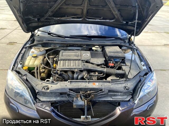 Серый Мазда 3, объемом двигателя 1.6 л и пробегом 282 тыс. км за 6000 $, фото 7 на Automoto.ua