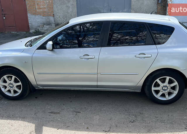 Сірий Мазда 3, об'ємом двигуна 1.6 л та пробігом 232 тис. км за 4200 $, фото 5 на Automoto.ua