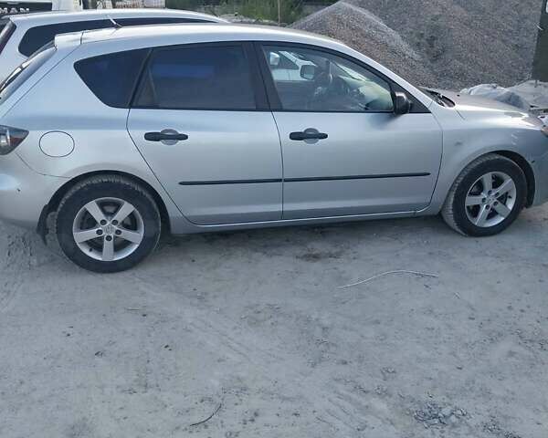 Сірий Мазда 3, об'ємом двигуна 1.35 л та пробігом 158 тис. км за 3700 $, фото 2 на Automoto.ua