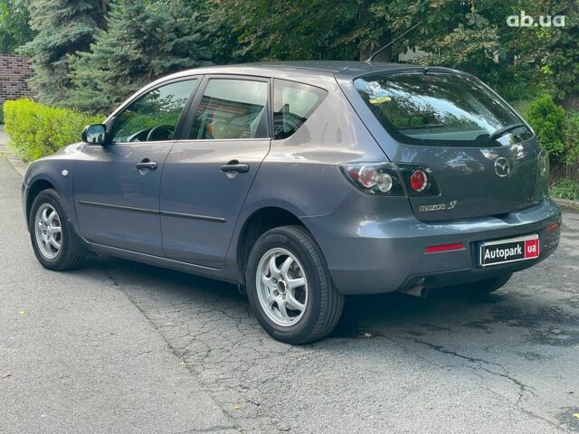 Сірий Мазда 3, об'ємом двигуна 1.4 л та пробігом 305 тис. км за 5340 $, фото 7 на Automoto.ua