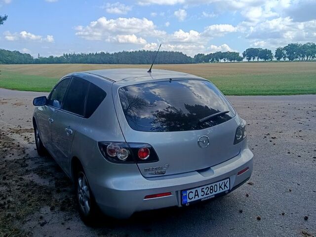 Серый Мазда 3, объемом двигателя 1.6 л и пробегом 254 тыс. км за 4800 $, фото 3 на Automoto.ua