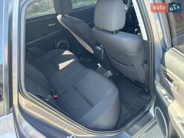 Сірий Мазда 3, об'ємом двигуна 1.6 л та пробігом 233 тис. км за 6000 $, фото 15 на Automoto.ua