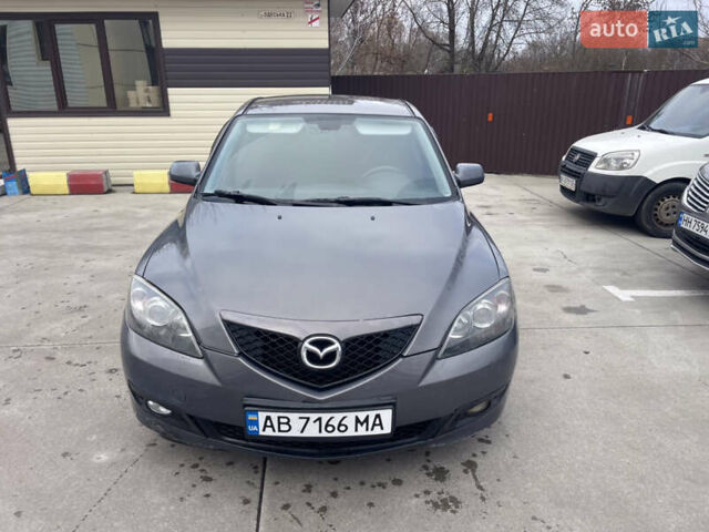 Серый Мазда 3, объемом двигателя 2 л и пробегом 299 тыс. км за 4300 $, фото 1 на Automoto.ua