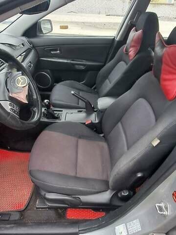 Серый Мазда 3, объемом двигателя 1.6 л и пробегом 370 тыс. км за 2200 $, фото 11 на Automoto.ua