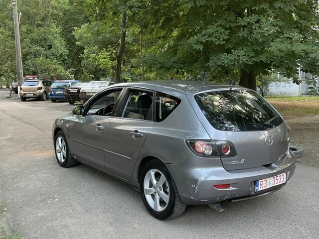 Серый Мазда 3, объемом двигателя 1.6 л и пробегом 250 тыс. км за 1950 $, фото 3 на Automoto.ua